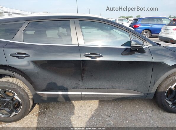KNDPVDDG2T7290896 2026 KIA SPORTAGE HYBRID Black Вид задньої частини салону