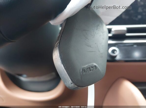 KNDPVDDG2T7314713 2026 KIA SPORTAGE HYBRID Кремовый Вид панели приборов