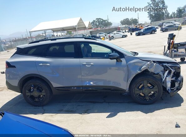 KNDPVDDG6T7338559 2026 KIA SPORTAGE HYBRID Gray Rear interior view