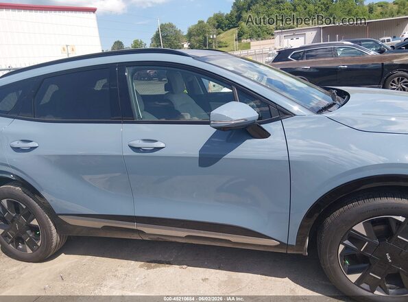 KNDPXDDG4T7324329 2026 KIA SPORTAGE HYBRID Blue Widok wnętrza z tyłu