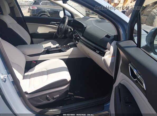 KNDPXDDG4T7324329 2026 KIA SPORTAGE HYBRID Blue Widok wnętrza z przodu