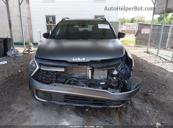 KNDPZDAH9P7097751 2023 KIA SPORTAGE PLUG-IN HYBRID Gray Vista interior trasera