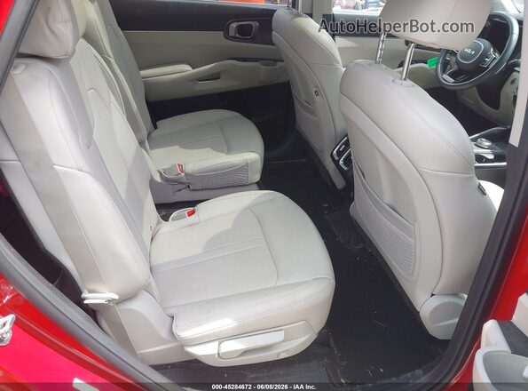 KNDRHDLG3P5210234 2023 KIA SORENTO HYBRID Burgundy Vista de la etiqueta del VIN