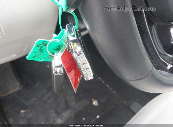 KNDRHDLG3P5210234 2023 KIA SORENTO HYBRID Burgundy Vista del salpicadero