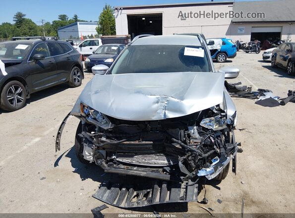KNMAT2MV6JP594969 2018 NISSAN ROGUE Серебряный Вид задней части салона