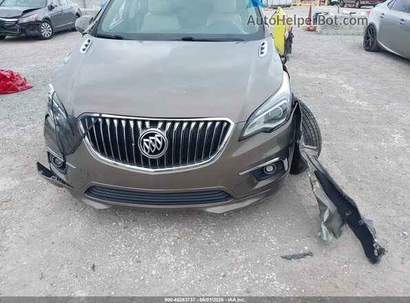 LRBFXBSA6HD042005 2017 BUICK ENVISION Brown Vista interior trasera