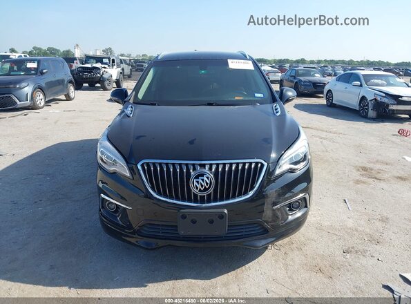 LRBFXBSA9HD103976 2017 BUICK ENVISION Beige Rear interior view