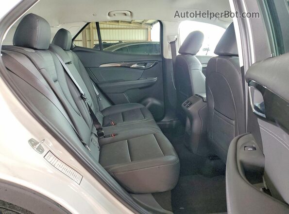 LRBFZME44RD023286 2024 BUICK ENVISION White Вид задньої частини салону