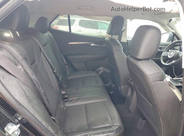 LRBFZME48RD067291 2024 BUICK ENVISION Black Սալոնի հետևի տեսք