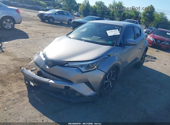 NMTKHMBX5JR039862 2018 TOYOTA C-HR Silver Առջևի ձախ երեք քառորդ տեսարան