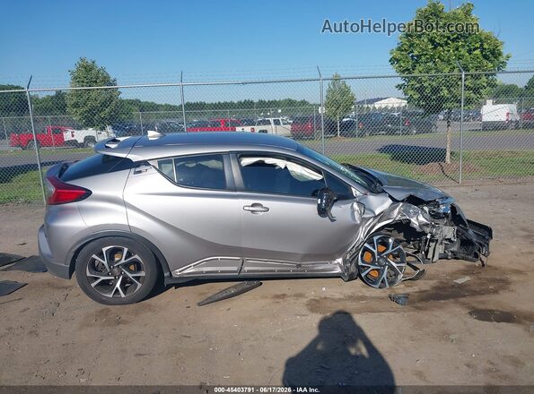 NMTKHMBX5JR039862 2018 TOYOTA C-HR Silver Սալոնի հետևի տեսք