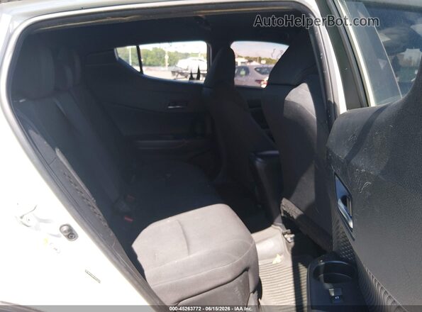 NMTKHMBX5KR093986 2019 TOYOTA C-HR White VIN კოდის სტიკერის ხედი