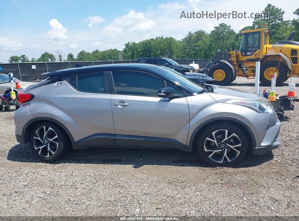 NMTKHMBX9KR093103 2019 TOYOTA C-HR Silver Vista interior trasera