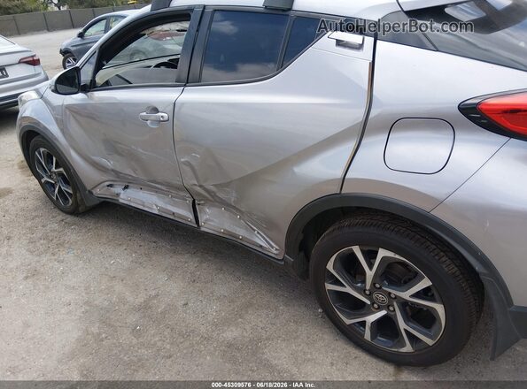 NMTKHMBXXJR023866 2018 TOYOTA C-HR Silver უკანა სალონის ხედი