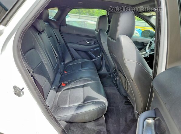 SADFL2GX8J1Z32754 2018 JAGUAR E-PACE White Rear seats view