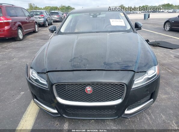 SAJBE4BV7GCY09211 2016 JAGUAR XF Черный Вид задней части салона