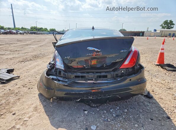 SAJWA1C75H8W10478 2017 JAGUAR XJ Black Rear view