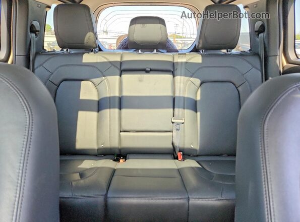 SALEJ7EX3R2284574 2024 LAND ROVER DEFENDER Brown Հետևի նստատեղերի տեսք