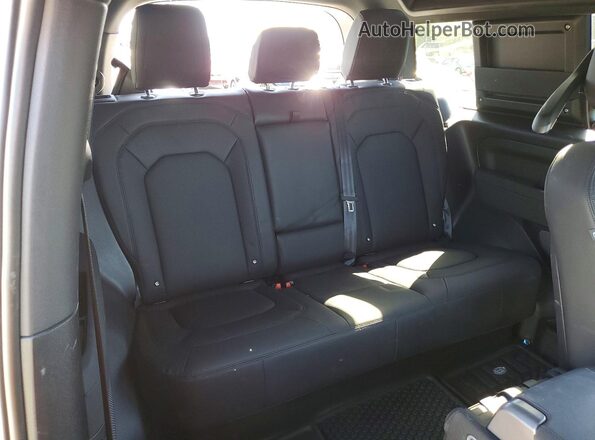 SALEW6EU3P2164000 2023 LAND ROVER DEFENDER Green Vista de los asientos traseros