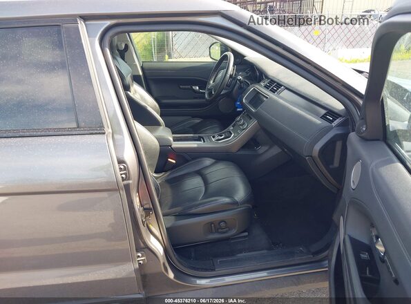 SALVP2RX8JH323740 2018 LAND ROVER RANGE ROVER EVOQUE Gray Front interior view