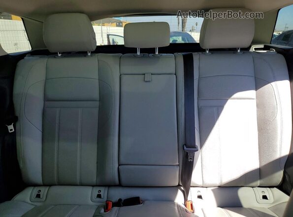 SALZJ2FX8RH242630 2024 LAND ROVER RANGE Silver Rear seats view