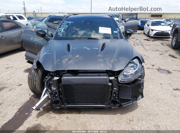 SD7VUJDW3STV12142 2025 ASTON MARTIN DBX Серый Вид задней части салона
