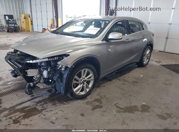 SJKCH5CP2HA033404 2017 INFINITI QX30 Gold Առջևի ձախ երեք քառորդ տեսարան