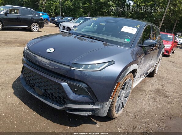 VCF1ZBU21PG005047 2023 FISKER OCEAN Blue Vista tres cuartos delantera izquierda