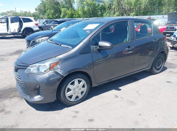 VNKKTUD30HA082580 2017 TOYOTA YARIS Gray Vista tres cuartos delantera izquierda