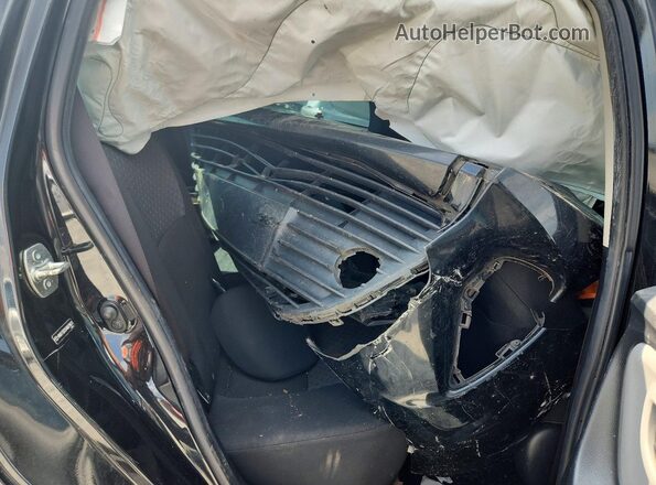 VNKKTUD35HA079612 2017 TOYOTA YARIS Black Rear seats view