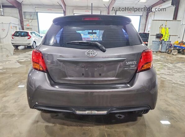 VNKKTUD38GA069865 2016 TOYOTA YARIS Gray Вид ззаду