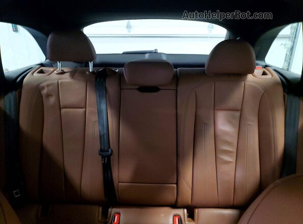 WA18AAF44MA017877 2021 AUDI A4 Black Vista de los asientos traseros