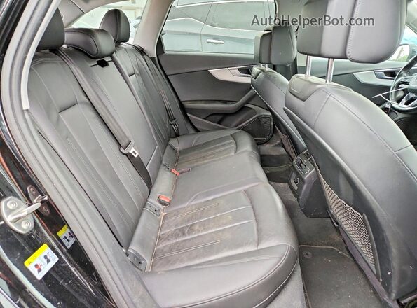 WA18NAF45HA106030 2017 AUDI A4 Black Vista de los asientos traseros
