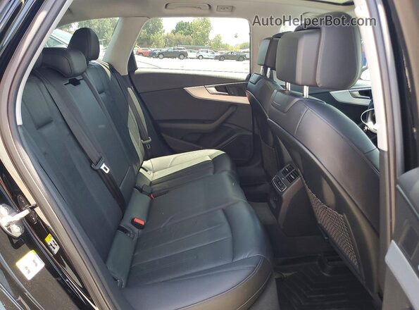 WA18NAF49HA037228 2017 AUDI A4 White Rear seats view