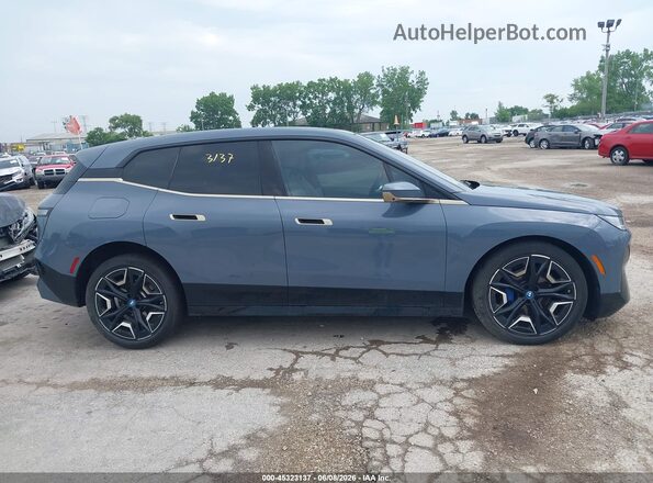 WB523CF00RCN58463 2024 BMW IX Gray Widok wnętrza z tyłu