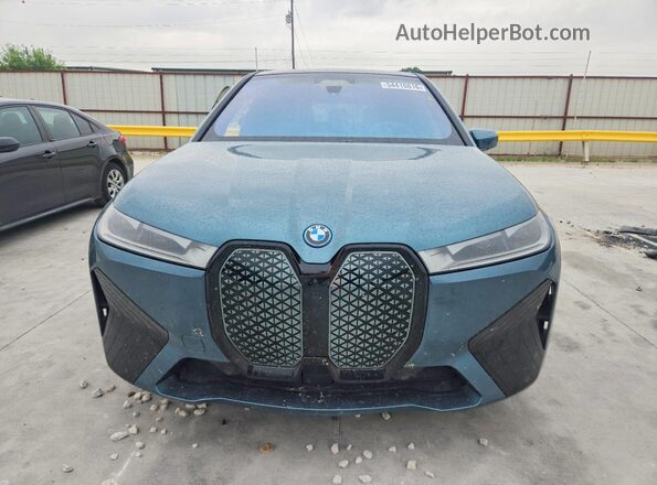 WB523CF03SCT49398 2025 BMW IX Синий Вид спереди