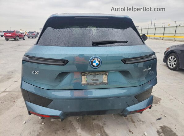 WB523CF03SCT49398 2025 BMW IX Синий Вид сзади