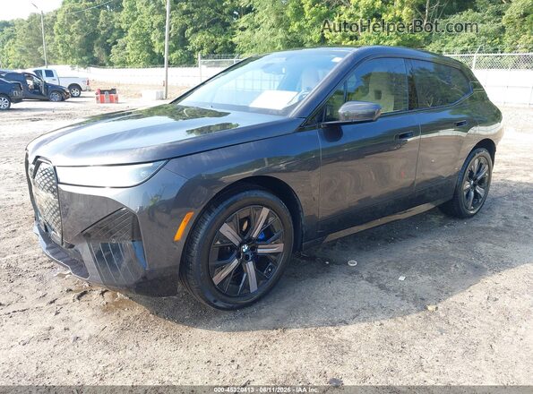 WB523CF04SCS15712 2025 BMW IX Black Front left