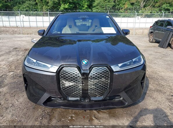 WB523CF04SCS15712 2025 BMW IX Black Rear interior view