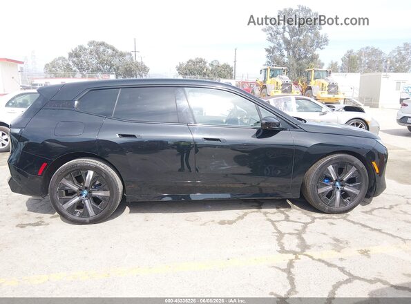 WB523CF06RCR48869 2024 BMW IX Black Вид задньої частини салону