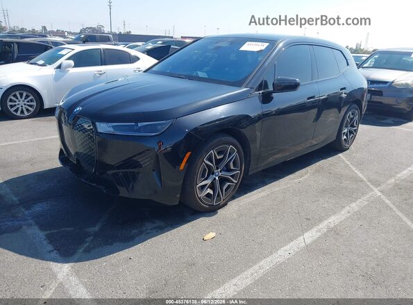 WB523CF06SCT92553 2025 BMW IX Черный Передняя левая четверть