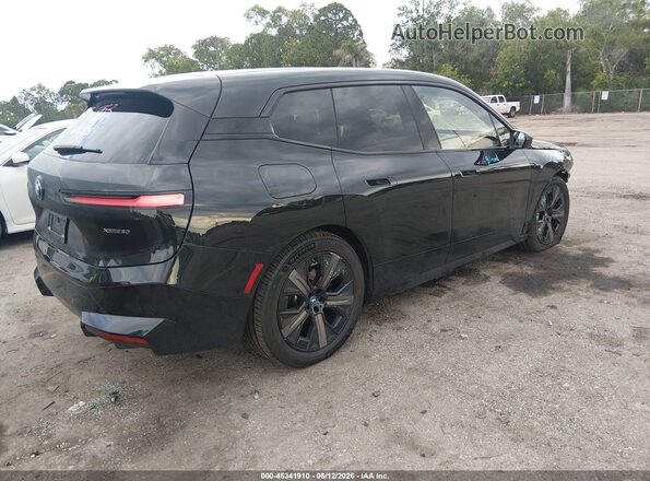WB523CF06SCU18407 2025 BMW IX Black Rear right
