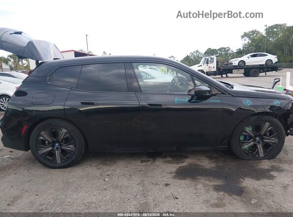 WB523CF06SCU18407 2025 BMW IX Black 360 interior view
