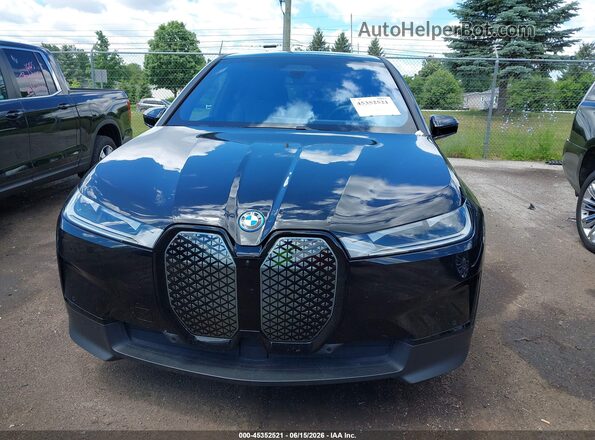 WB523CF07RCR91990 2024 BMW IX Black Instrument cluster view