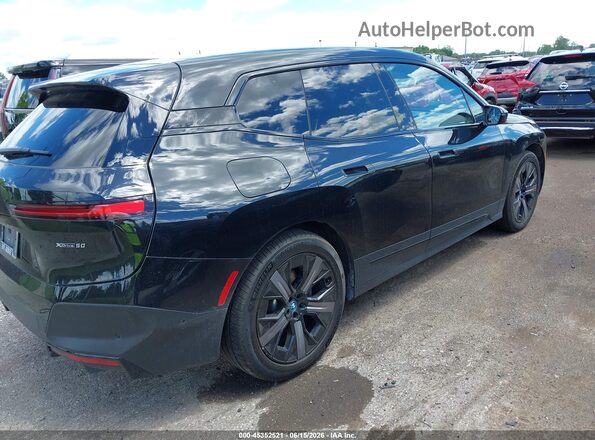 WB523CF07RCR91990 2024 BMW IX Black Rear right