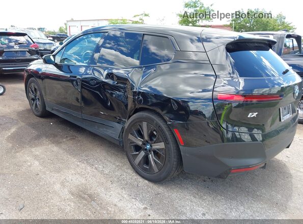 WB523CF07RCR91990 2024 BMW IX Black Rear left