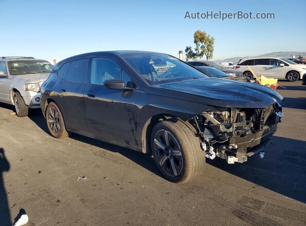 WB523CF07SCS50339 2025 BMW IX Black Front right