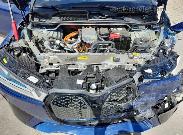 WB523CF08SCU58827 2025 BMW IX Синий Вид подкапотного пространства