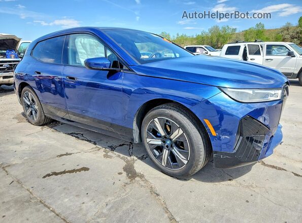 WB523CF08SCU58827 2025 BMW IX Синий Передняя правая четверть