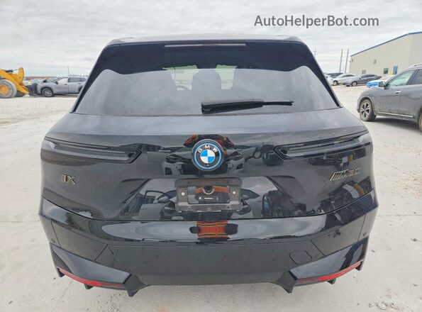 WB533CF00SCT39190 2025 BMW IX Black უკანა ხედი